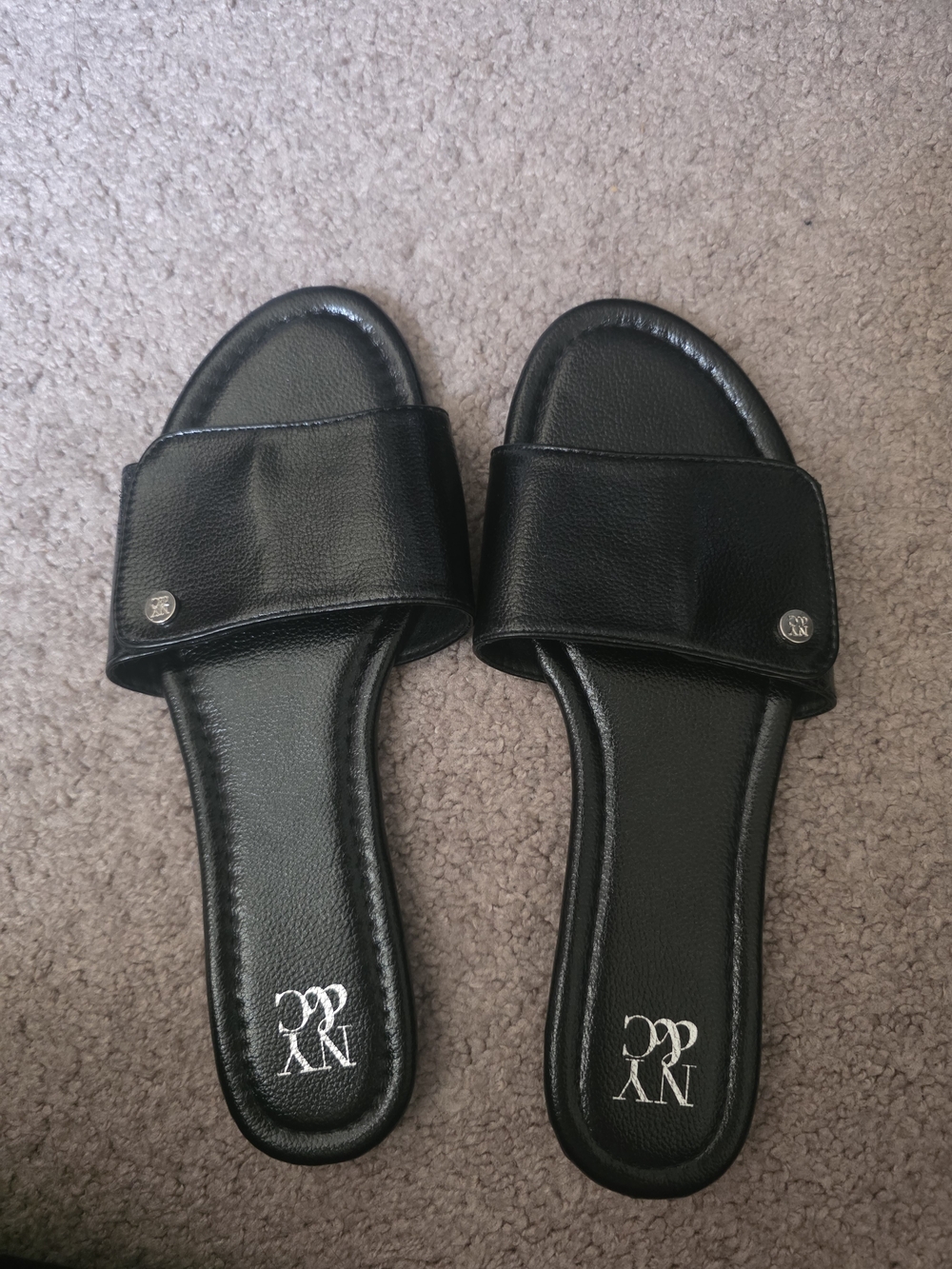 New York & Company Black Slide Sandals with Branded Medallions
